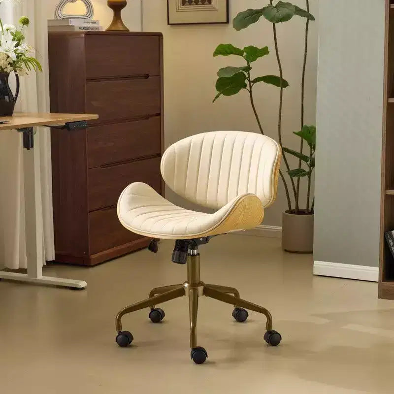 Karl Home | Chaise de bureau courbée en PU avec piètement bronze antique