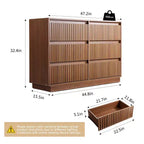 Commode 6 tiroirs KOLIGEY 119 cm de large avec panneaux cannelés ondulés