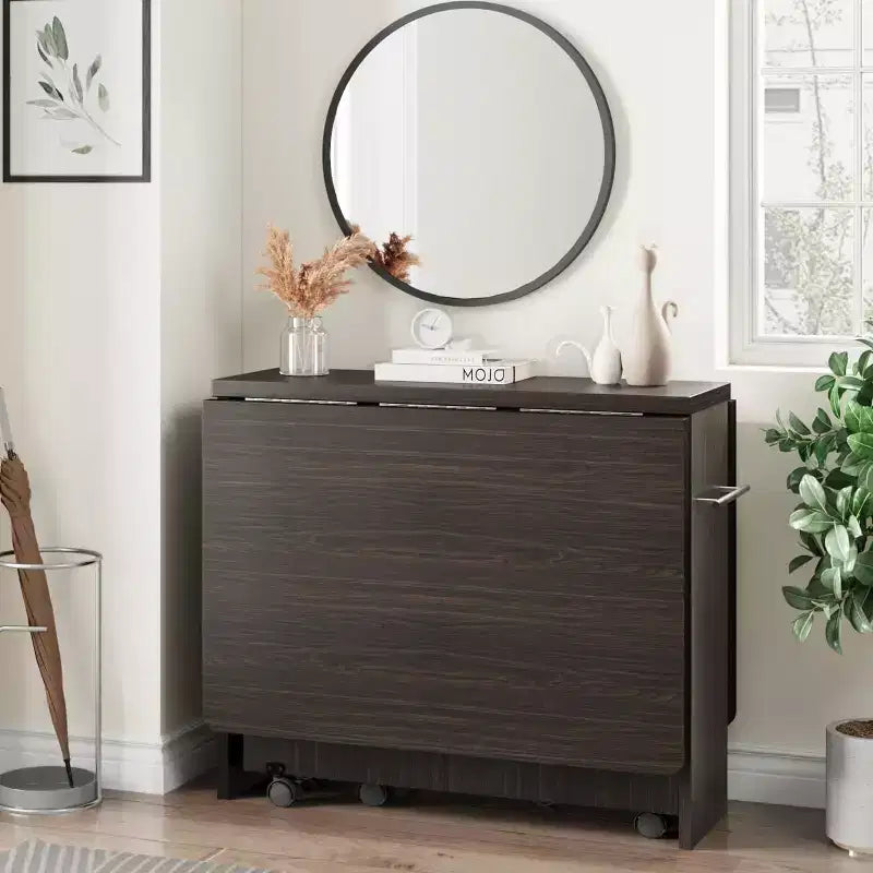 Table pliante multifonction FULVARI avec roulettes, 2 étagères de rangement, casier, poignée, pour salle à manger, bureau, salon
