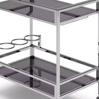 Chariot de bar WyndenHall Snell Chrome : verre et acier modernes, étagère fixe, utilisation en intérieur, capacité de 45 kg
