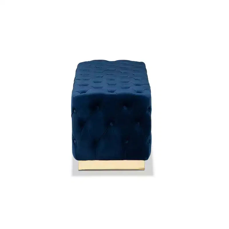 Pouf en velours Corrine et similicuir bleu marine/doré - Baxton Studio : Siège capitonné et rembourré, cadre en bois, décor de luxe