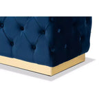 Pouf en velours Corrine et similicuir bleu marine/doré - Baxton Studio : Siège capitonné et rembourré, cadre en bois, décor de luxe
