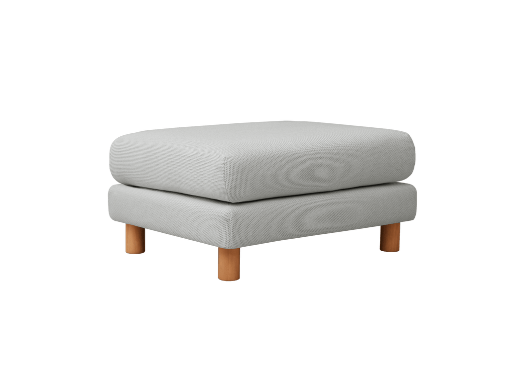 Sofa Ottoman – The Sofa Ottoman is a companion piece for the Sofa, featuring timber feet and a classic silhouette that fits most room styles