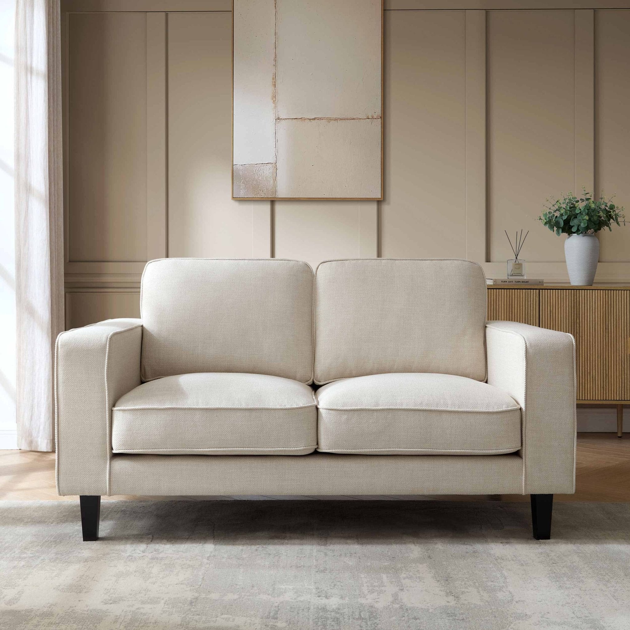2 Seater Sofa - Beige – In a beautiful shade of beige, add a touch of sophisticated comfort and classic style to your home with our 2-seater sofa from the collection