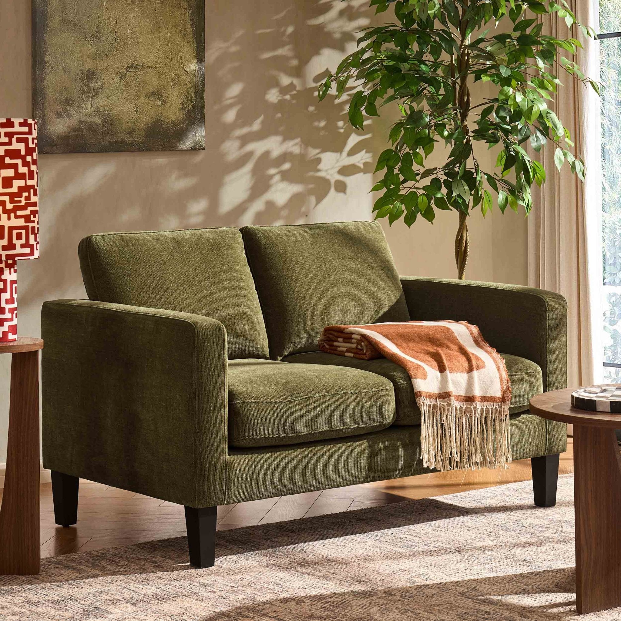 Compact two-seater sofa - Chenille olive - combines the style of classic design with comfort, perfectly sized for small spaces.