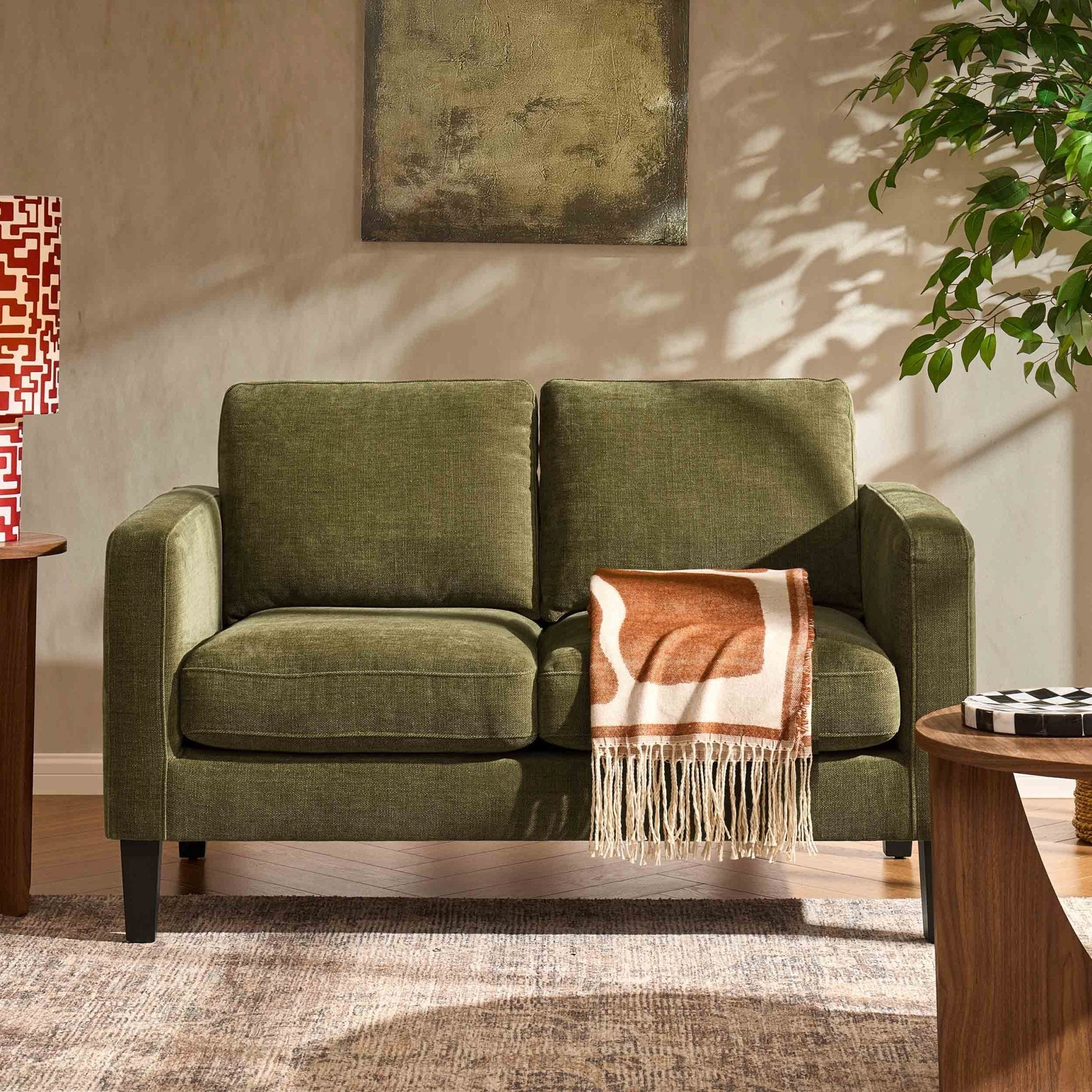 Compact two-seater sofa - Chenille olive - combines the style of classic design with comfort, perfectly sized for small spaces.